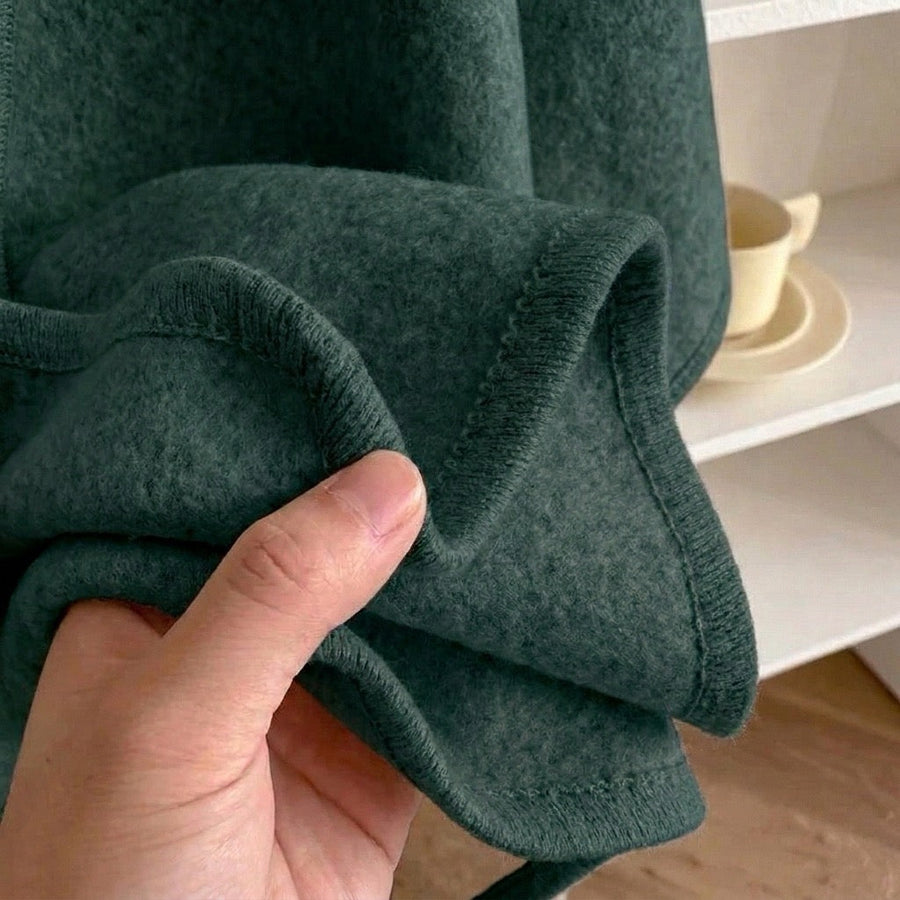 VALERIA | CAPA TIPO PONCHO DE PUNTO CON CINTURÓN
